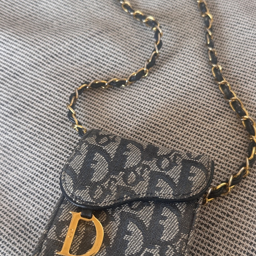 Dior Black and Cream Crossbody Bag
Faded from sun exposure - Picture 2 of 3